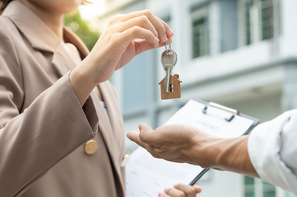 Home owner receiving house keys