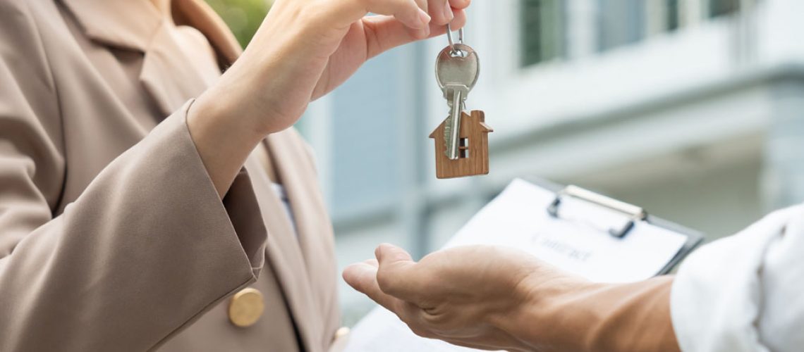 Home owner receiving house keys