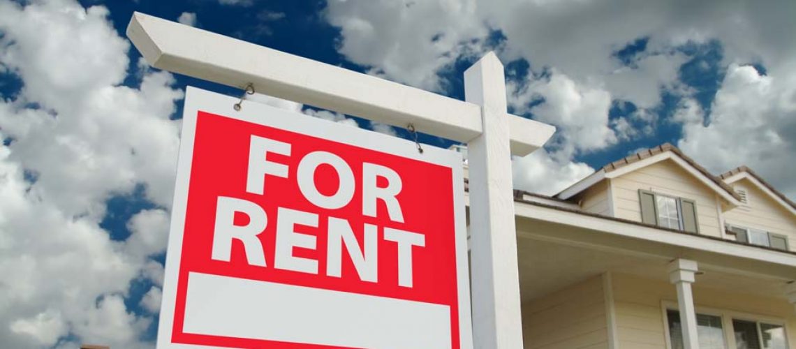 For Rent Sign in front of House